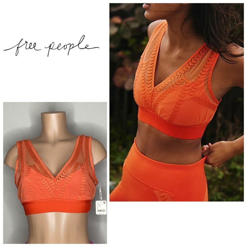 New. Free People orange sports bra. Medium.